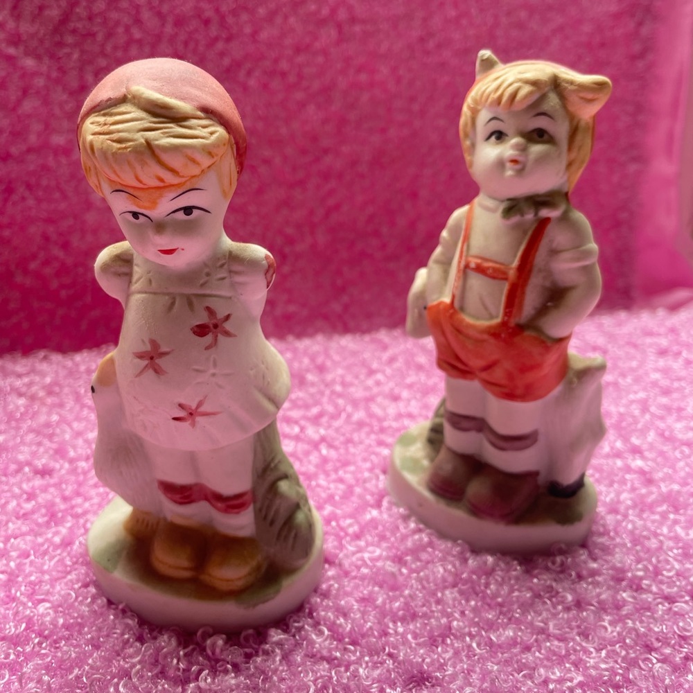 Vintage boy and girl figurines